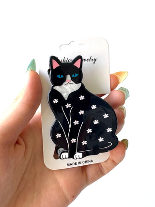 Gatito con flor